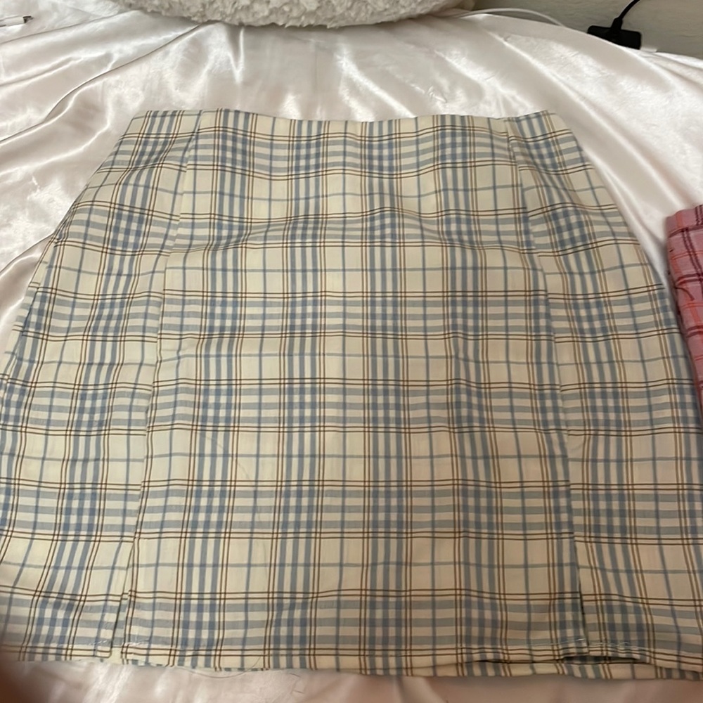 1 set of 3 plaid skirts with double slits on the bottom